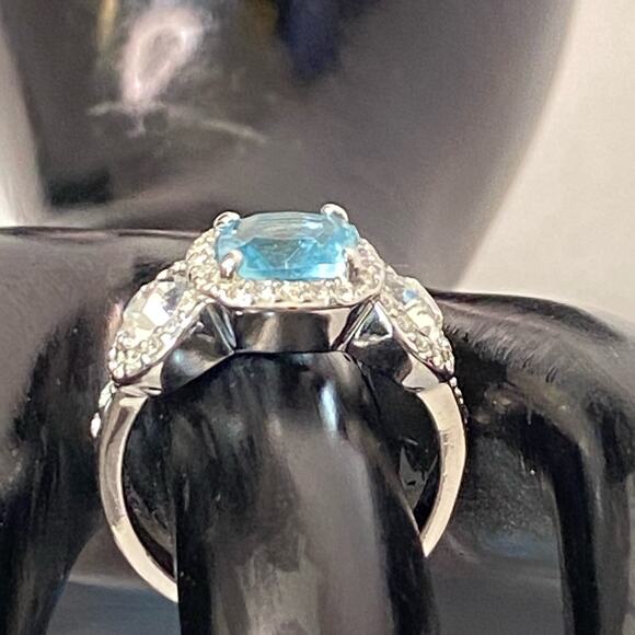Silver Tone Cocktail Ring With Aqua Blue Central Stone And Clear Side Stones - Picture 1 of 9